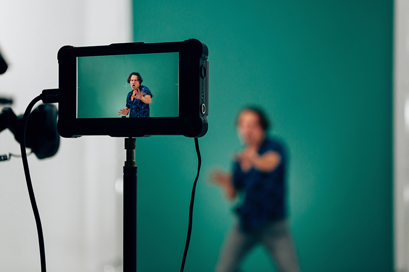 actor in acting against green key background