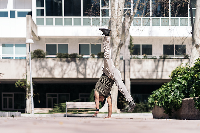 Amazing break dance dancer practicing in the park and showing his talent.